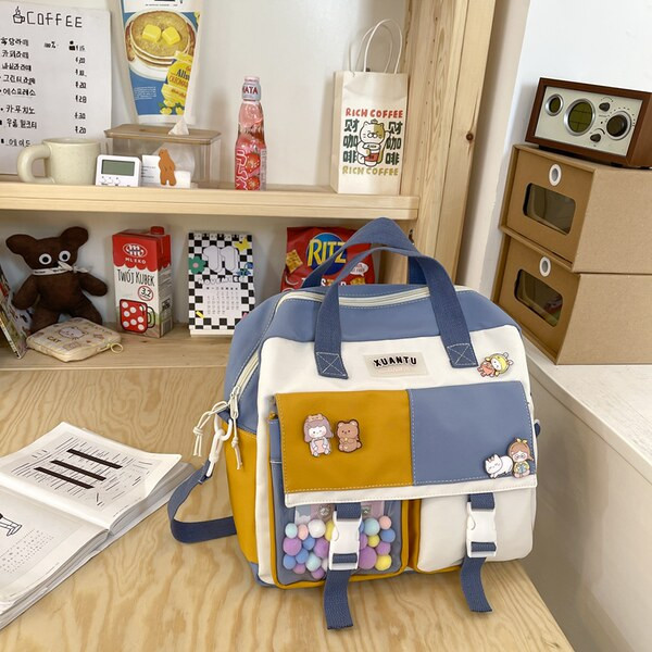 Vízálló gyerek hátizsák zsebbel és rátéttel