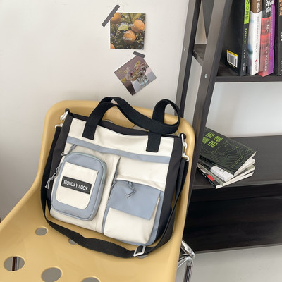 Gyermek táska felirattal és fogantyúval