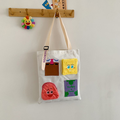 Παιδική τσάντα πάνινη με πολύχρωμες τσέπες