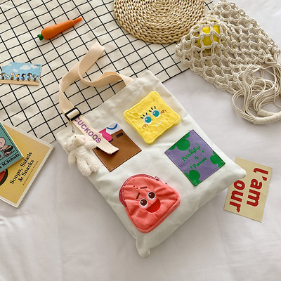 Παιδική τσάντα πάνινη με πολύχρωμες τσέπες