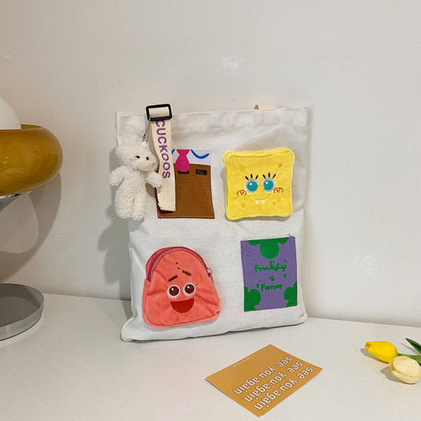 Παιδική τσάντα πάνινη με πολύχρωμες τσέπες