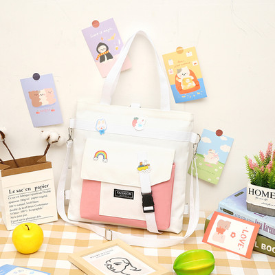 Tekstila bērnu soma ar aplikāciju un uzrakstu