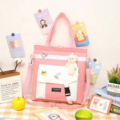 Tekstila bērnu soma ar aplikāciju un uzrakstu