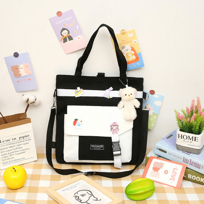 Tekstila bērnu soma ar aplikāciju un uzrakstu