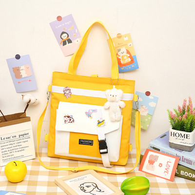 Tekstila bērnu soma ar aplikāciju un uzrakstu