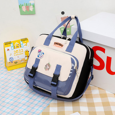 Dječja torba s vanjskim džepom i kopčom