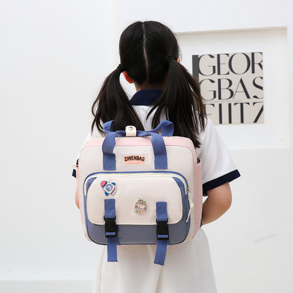 Dječja torba s vanjskim džepom i kopčom