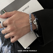 Moderna vīriešu rokassprādze ar krāsainiem akmeņiem