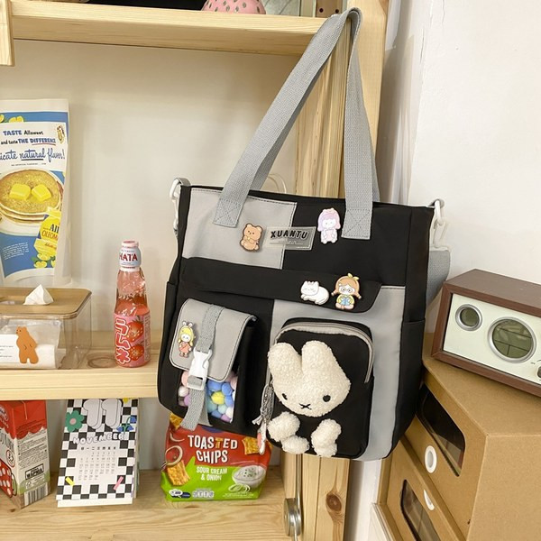 Bērnu tekstila mugursoma ar 3D elementiem un garu rokturi