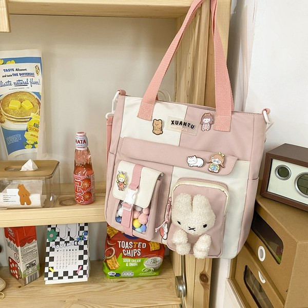 Bērnu tekstila mugursoma ar 3D elementiem un garu rokturi