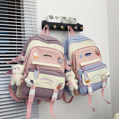 Textile backpack with inscription and 3D elements for boys and girls