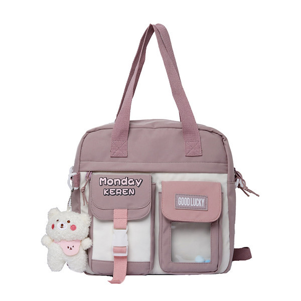 Ležerna dječja tekstilna torba s natpisom i privjeskom za ključeve