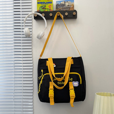 Tekstilna torba s izvezenim tekstom i privjeskom za dječake i djevojčice