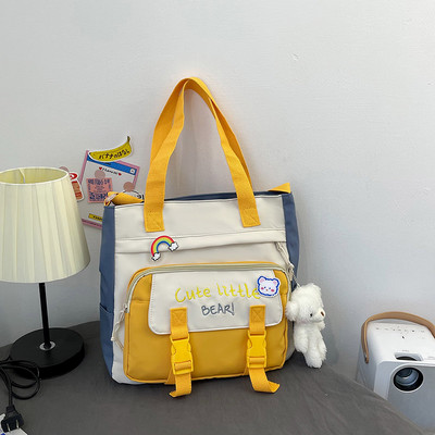 Tekstilna torba s izvezenim tekstom i privjeskom za dječake i djevojčice