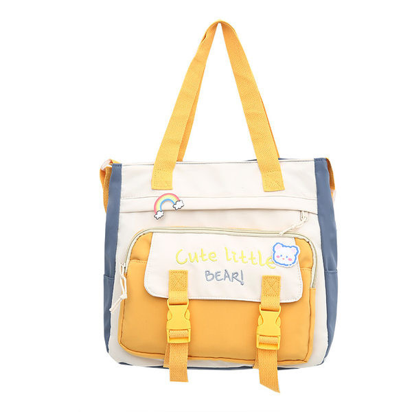 Tekstilna torba s izvezenim tekstom i privjeskom za dječake i djevojčice