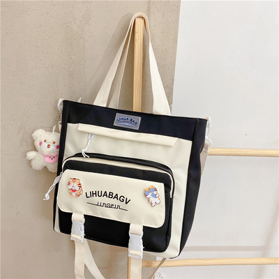 Bērnu soma ar uzrakstu un aplikāciju - no tekstila