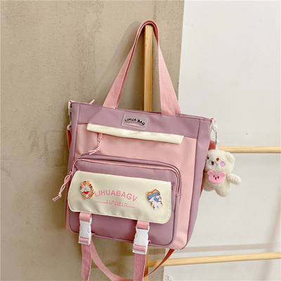 Bērnu soma ar uzrakstu un aplikāciju - no tekstila