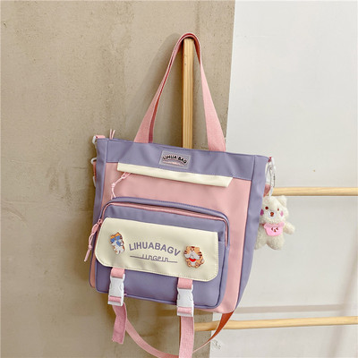 Bērnu soma ar uzrakstu un aplikāciju - no tekstila