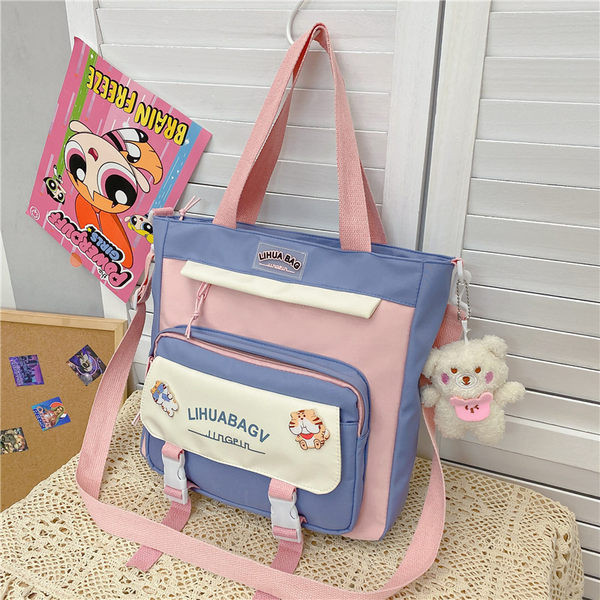 Bērnu soma ar uzrakstu un aplikāciju - no tekstila