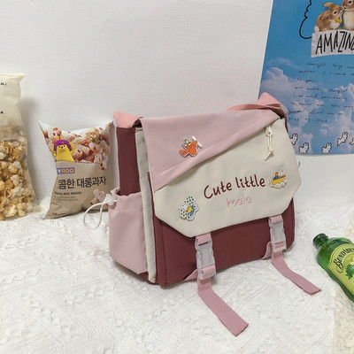 Tekstilni ruksak u obliku dječje školske torbe