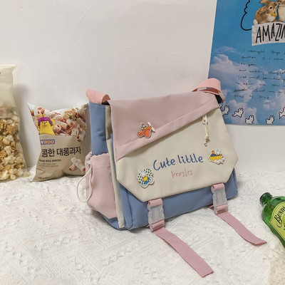 Tekstilni ruksak u obliku dječje školske torbe