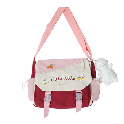 Tekstilni ruksak u obliku dječje školske torbe