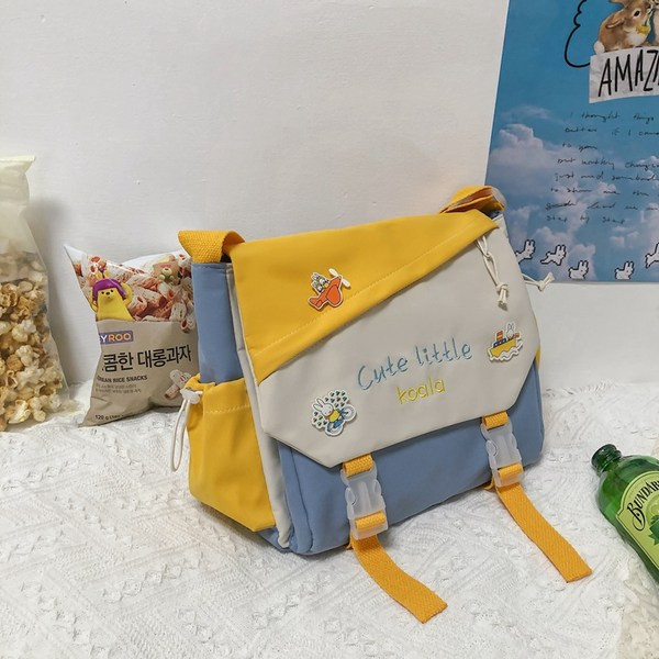 Tekstilni ruksak u obliku dječje školske torbe