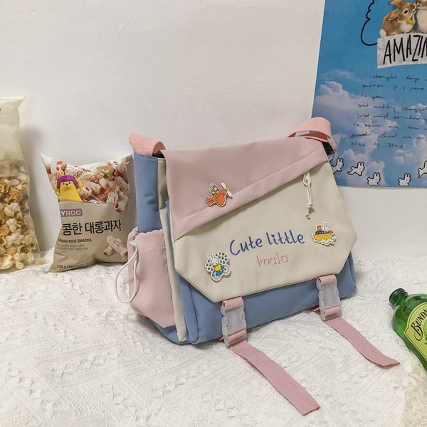 Tekstilni ruksak u obliku dječje školske torbe