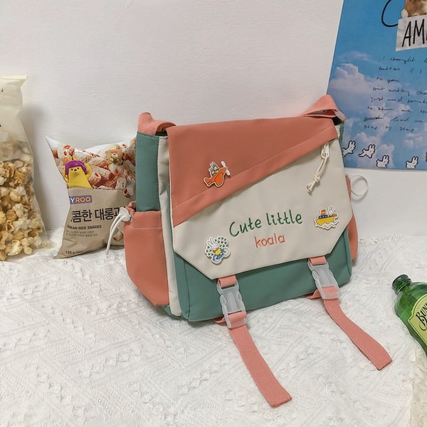 Tekstilni ruksak u obliku dječje školske torbe