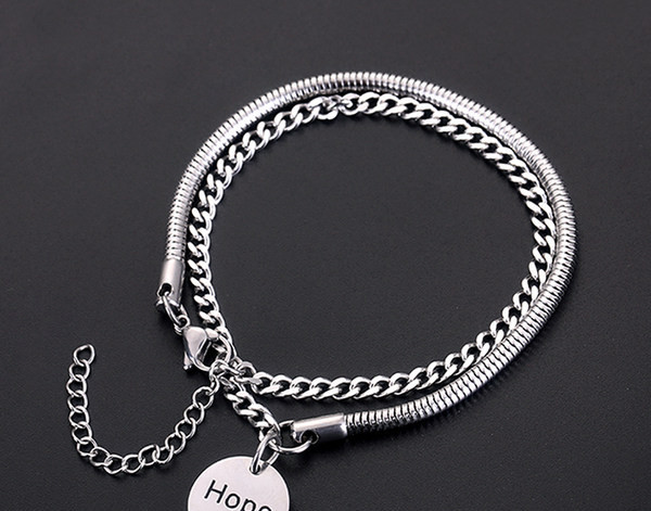 Acél férfi karkötő felirattal