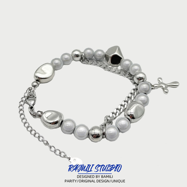 Vīriešu rokassprādze ar pērlēm un kulonu