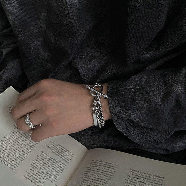 Ezüst fonott férfi karkötő