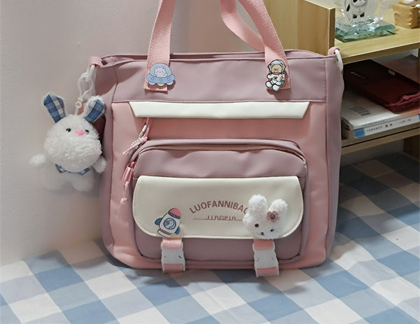 Dječje torbe s velikim džepom i ručkom