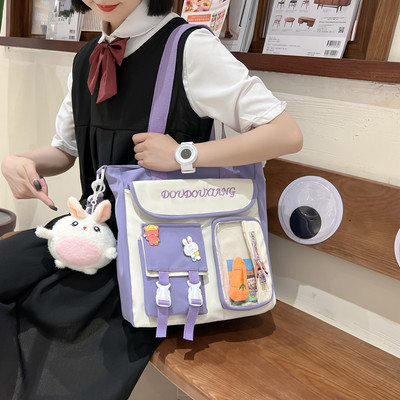 Gyermek iskolai hátizsák zsebbel és vállpánttal