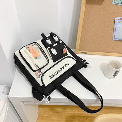 Gyermek iskolai hátizsák zsebbel és vállpánttal