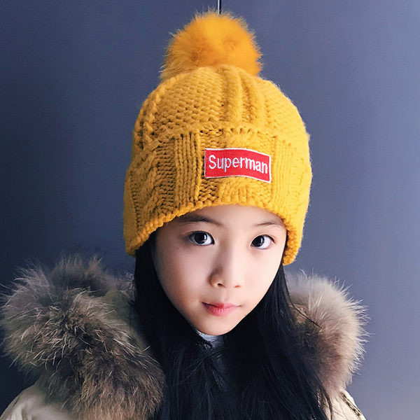 Dječje kape s perom i printom