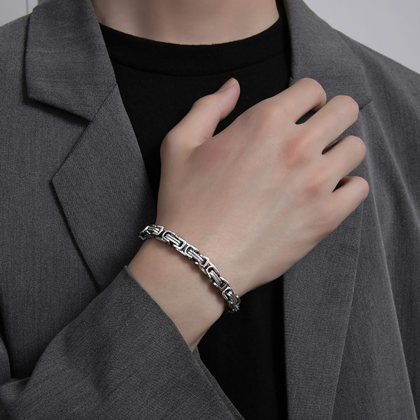 Fonott titán acél férfi karkötő