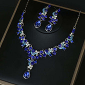 Moderns sieviešu auskaru un kaklarotas komplekts ar dekoratīviem akmeņiem