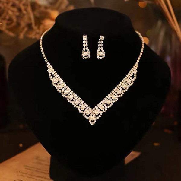 Elegants sieviešu kaklarotas un auskaru komplekts ar dekoratīviem akmeņiem