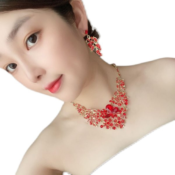 Ženska svečana ogrlica i set naušnica s kamenjem