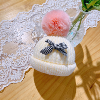 Adīta bērnu cepure ar lentīti meitenēm