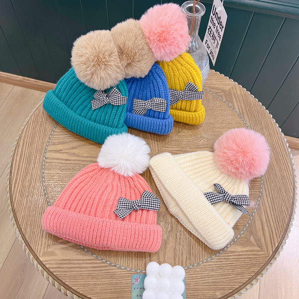 Adīta bērnu cepure ar lentīti meitenēm