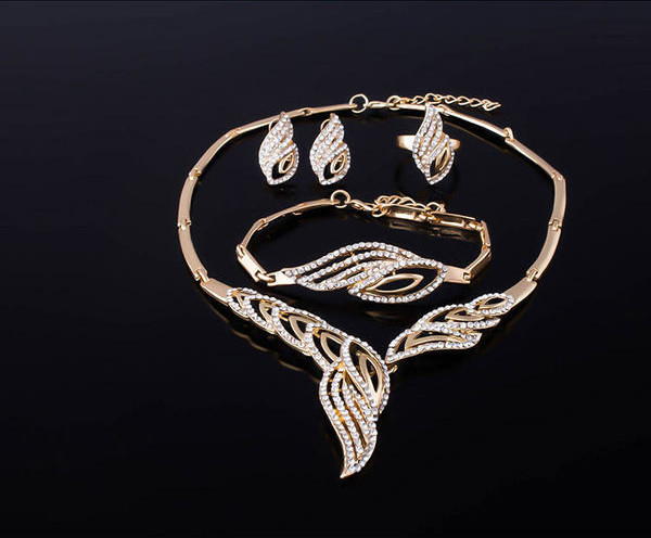 Sieviešu komplekts kaklarota, auskari, gredzens un rokassprādze ar akmeņiem