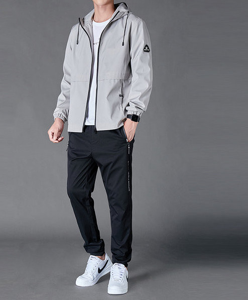 Vīriešu treniņtērps ar kabatu