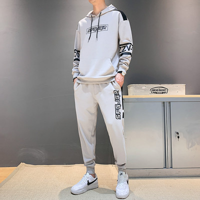 Alkalmi férfi ruha felirattal és nyakkendővel