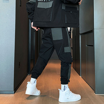 Modes divdaļīgs treniņtērps vīriešiem ar apdruku mugurpusē