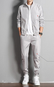 Férfi sportcsapat cipzárral és zsebbel