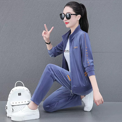 Sieviešu divdaļīgs komplekts ar apdruku un rāvējslēdzēja aizdari