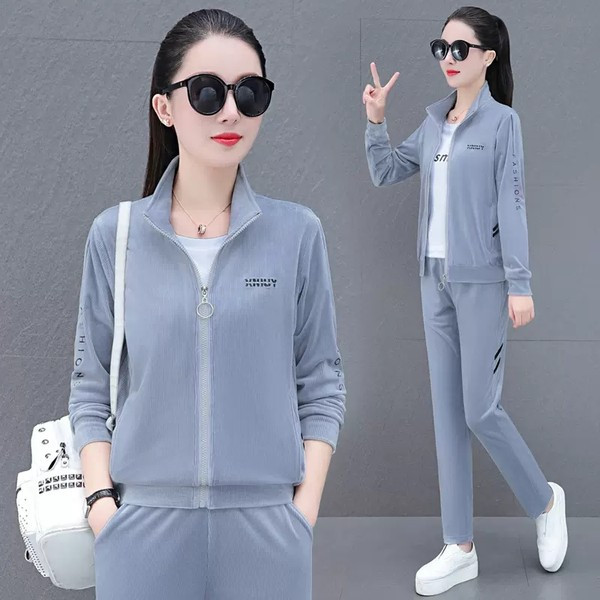 Sieviešu divdaļīgs komplekts ar apdruku un rāvējslēdzēja aizdari