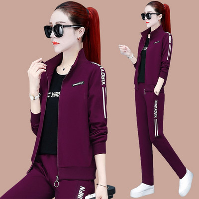 Įvairių spalvų moterų komandinis užsegimas užtrauktuku